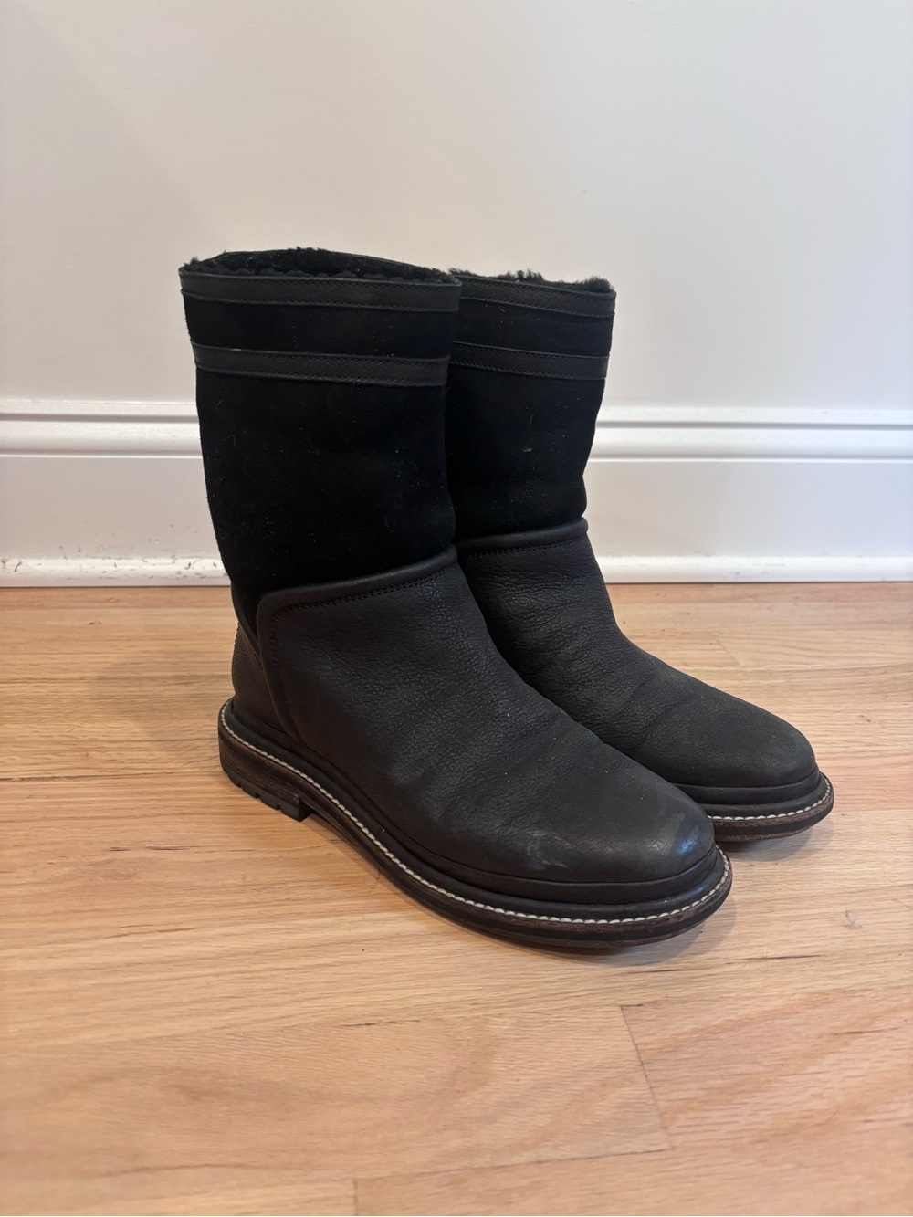 CHANEL black leather & suede boots with an embossed CC logo on heel size 37